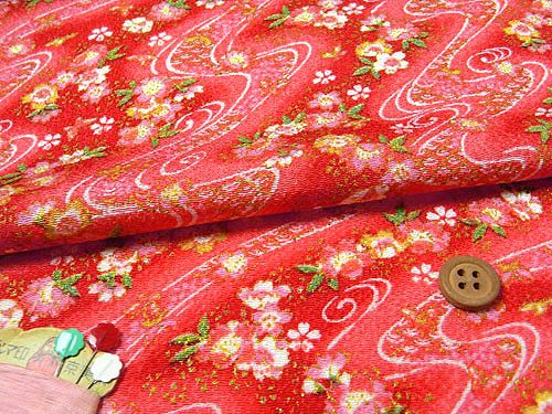 ちりめん生地・らせん流水に花と蝶(赤) 10cm単位 切り売り |生地