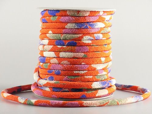 ちりめん丸ひも・柄・４ミリ（実寸約5-6ミリ）　流水桜・オレンジ