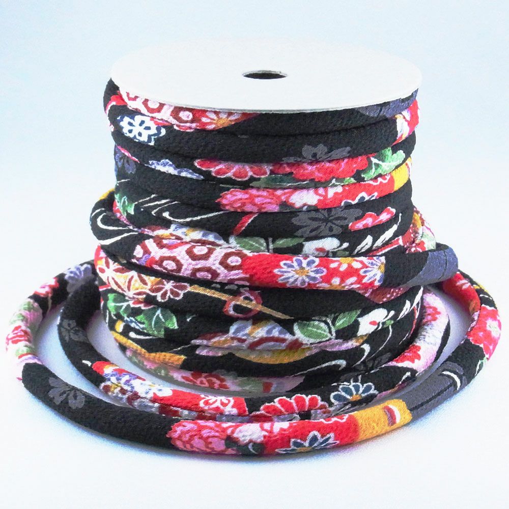 ちりめん丸ひも・柄・８ミリ（実寸約9-10ミリ）　典雅・黒