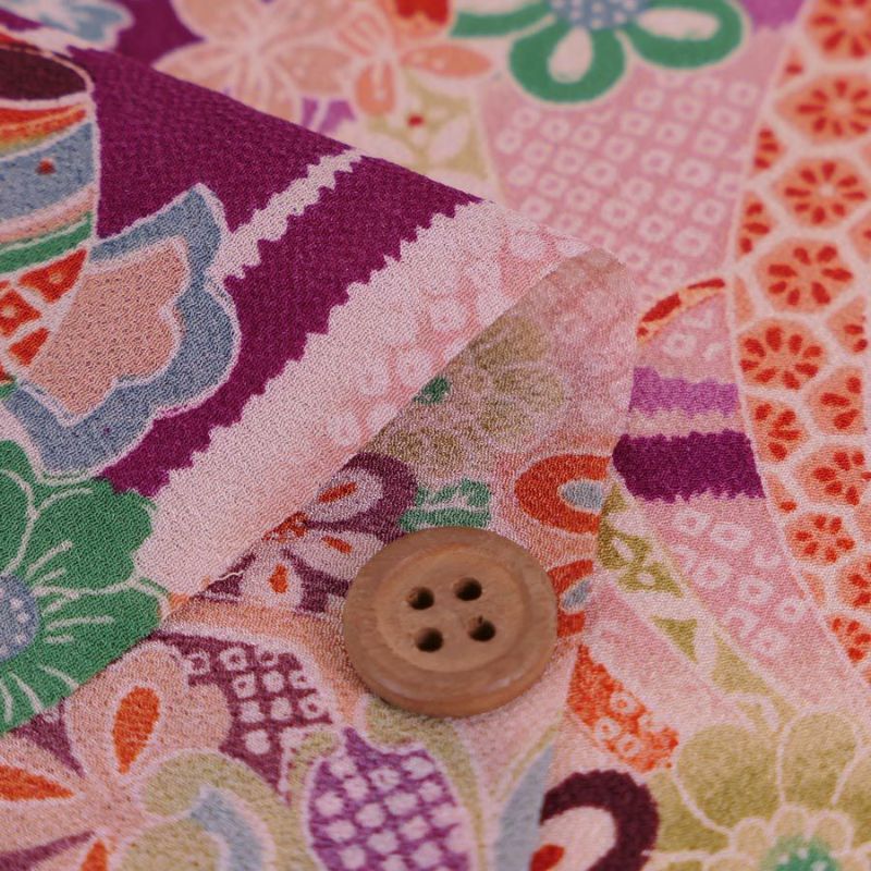 一越ちりめん生地 しぼりに花のし小槌文様(紫)