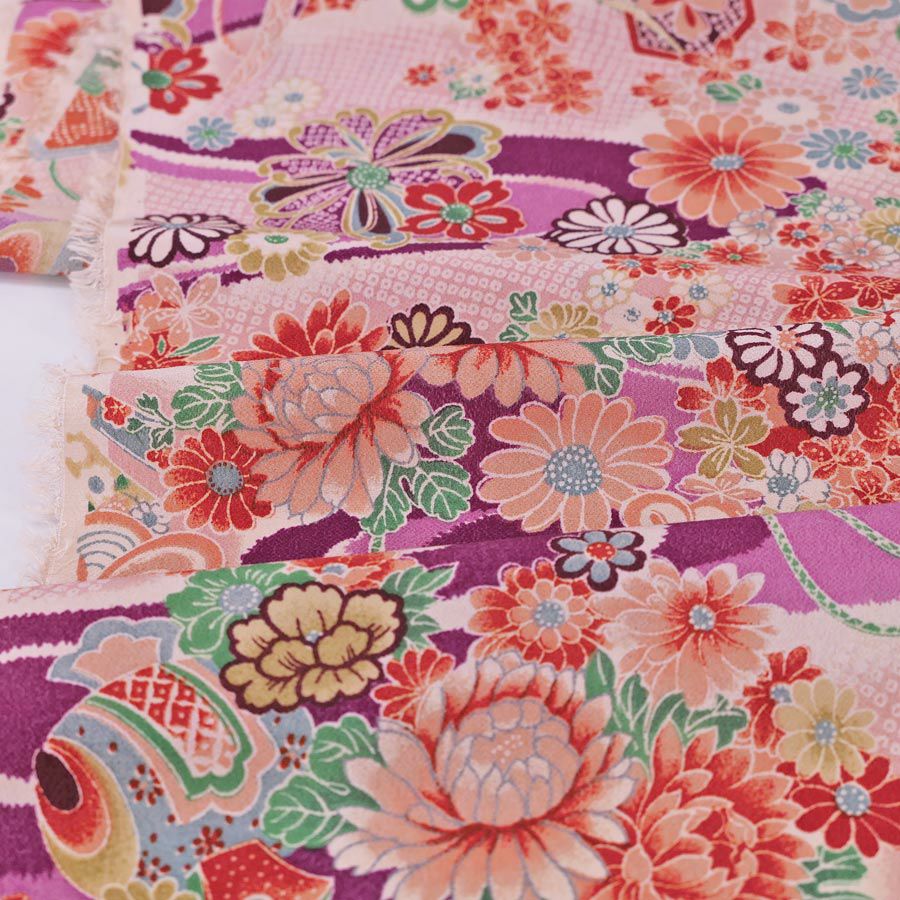 一越ちりめん生地 しぼりに花のし小槌文様(紫)