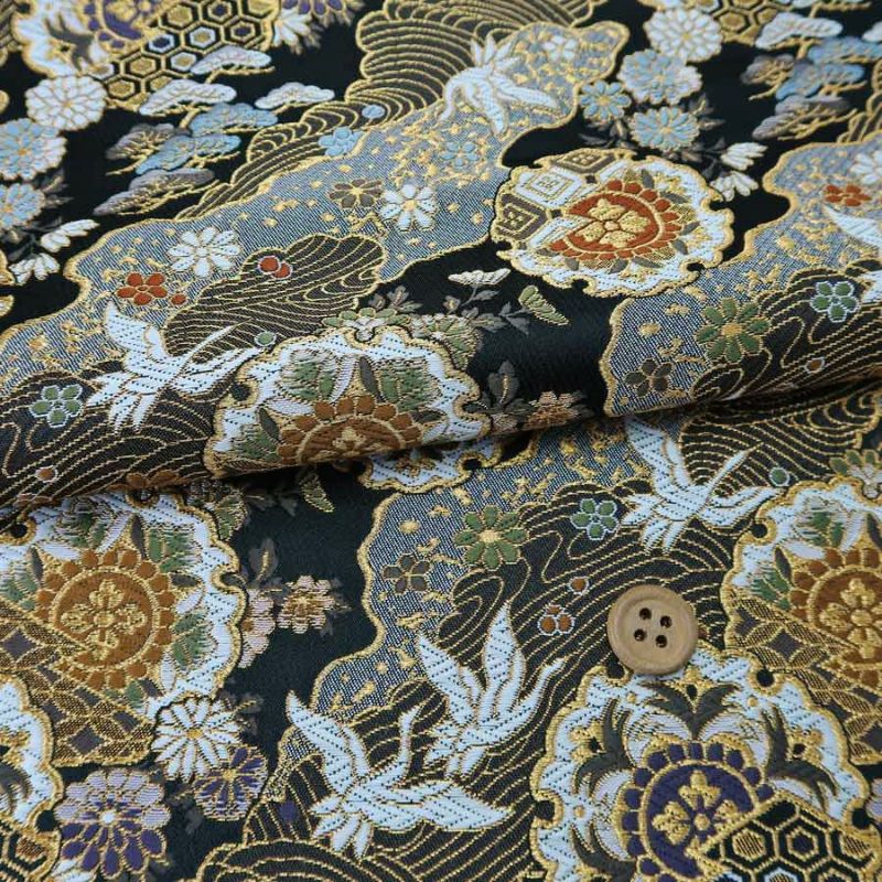 金襴生地(金らん) 道長取りに雪輪と鶴(黒)