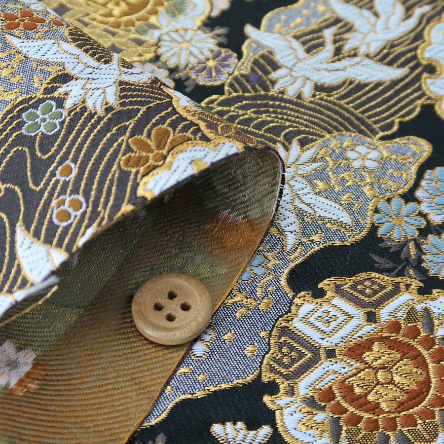 金襴生地(金らん) 道長取りに雪輪と鶴(黒)