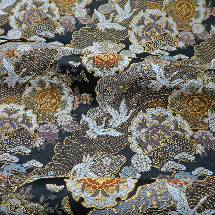 金襴生地(金らん) 道長取りに雪輪と鶴(黒)