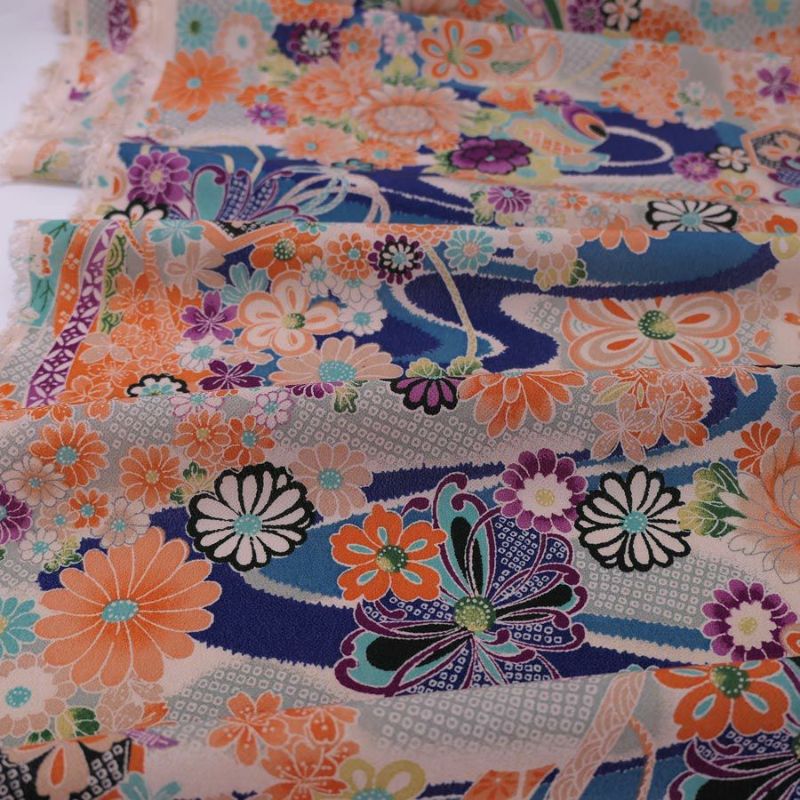 一越ちりめん生地 しぼりに花のし小槌文様(青) 10cm単位 切り売り