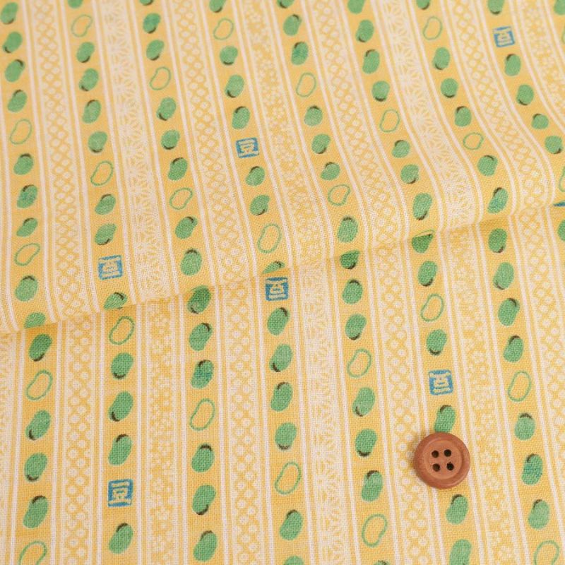 和柄コットン生地 お豆と伝統柄の縞模様(クリーム色) KOKKA和みごころモーリークロス