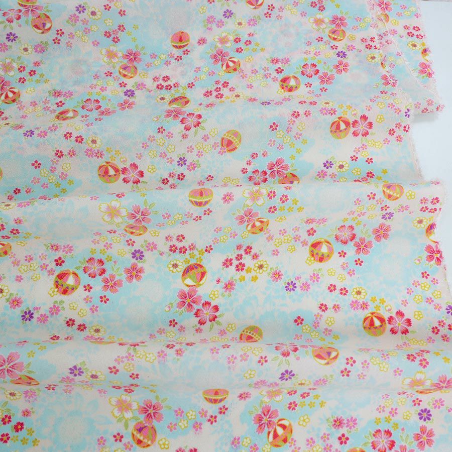 一越ちりめん生地 かすみ桜に手まり(水色) 10cm単位 切り売り つまみ細工縮緬柄ものライトブルーピンク ひとこしチリメン