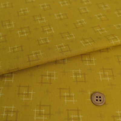 和柄コットン生地 井絣もよう(からし色) 10cm単位 切り売り