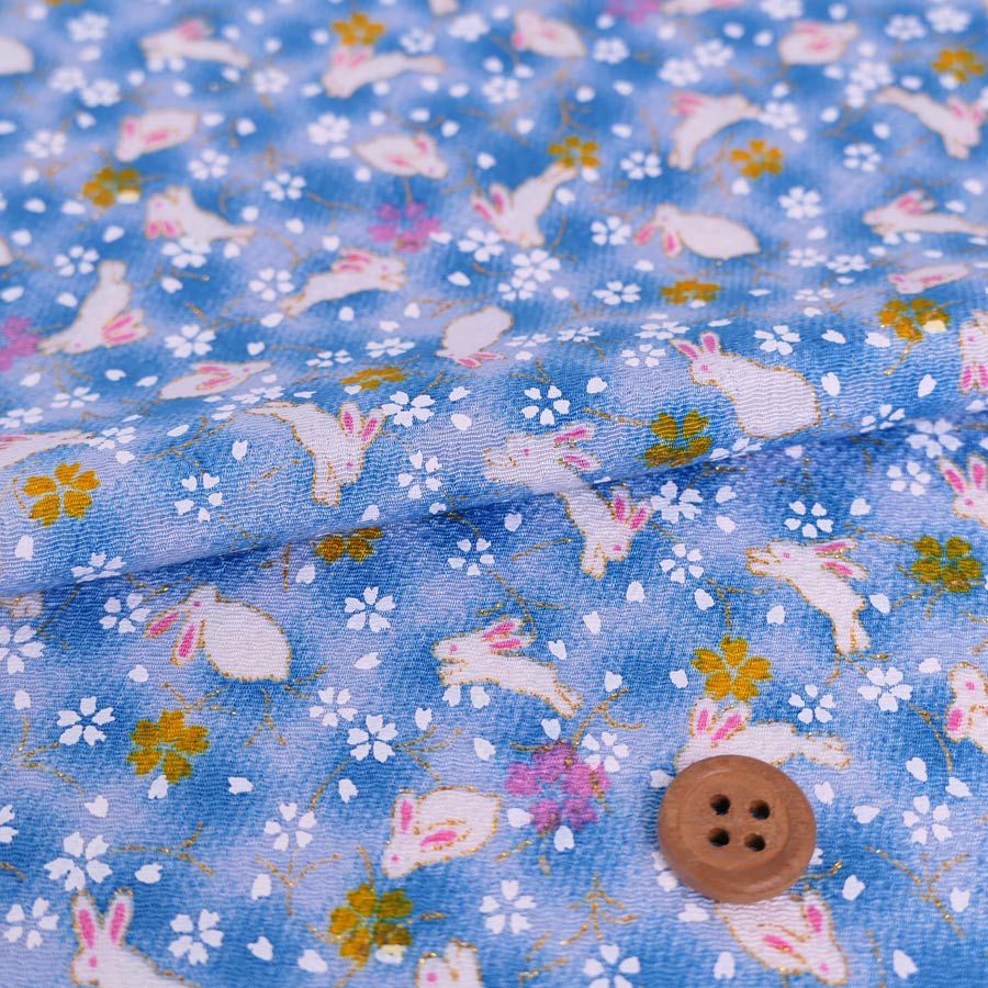 ちりめん生地・うさぎと桜(水色) 10cm単位 切り売り レーヨンちりめん生地 ウサギ柄縮緬 兎兔さくら 可愛いチリメン