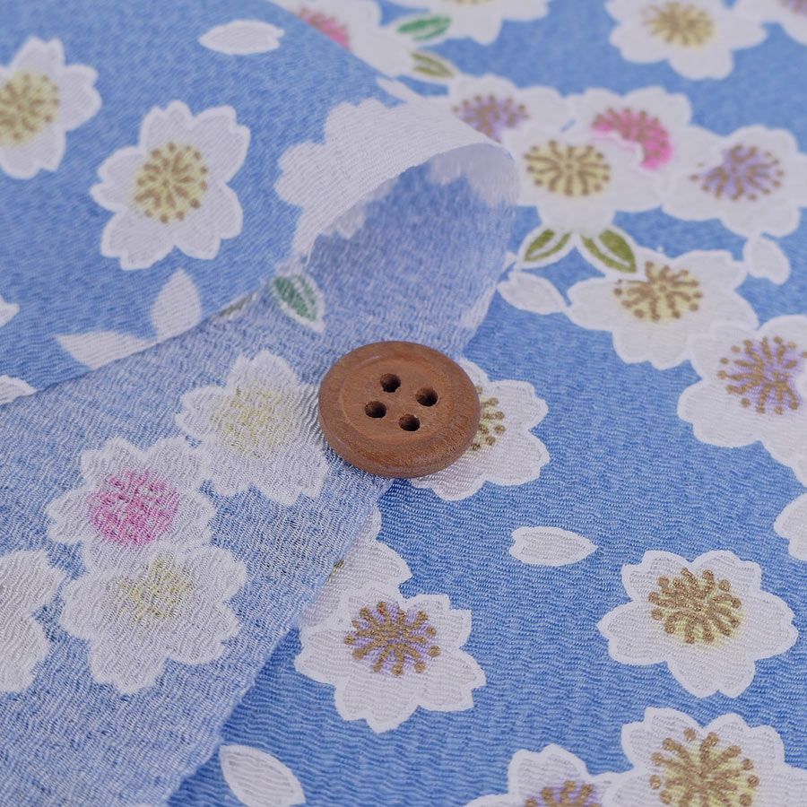 ちりめん生地 白桜(ブルー) 10cm単位 切り売り ちりめん細工向き鬼縮緬 オニチリメン 手芸用 ブルー地桜柄