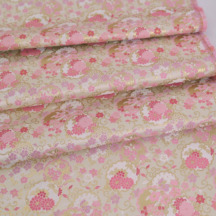 金襴生地(金らん) 重ね雪輪に唐草花尽くし(白/ピンク) 10cm単位 切り売り