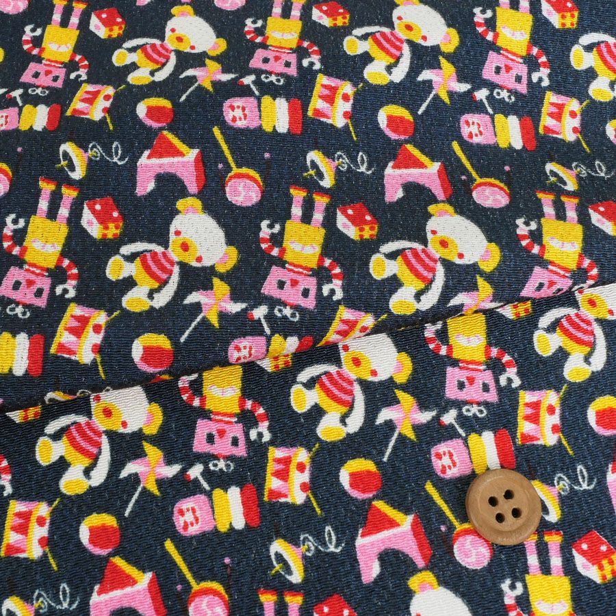 ちりめん生地 おもちゃのパレード(紺) 10cm単位 切り売り
