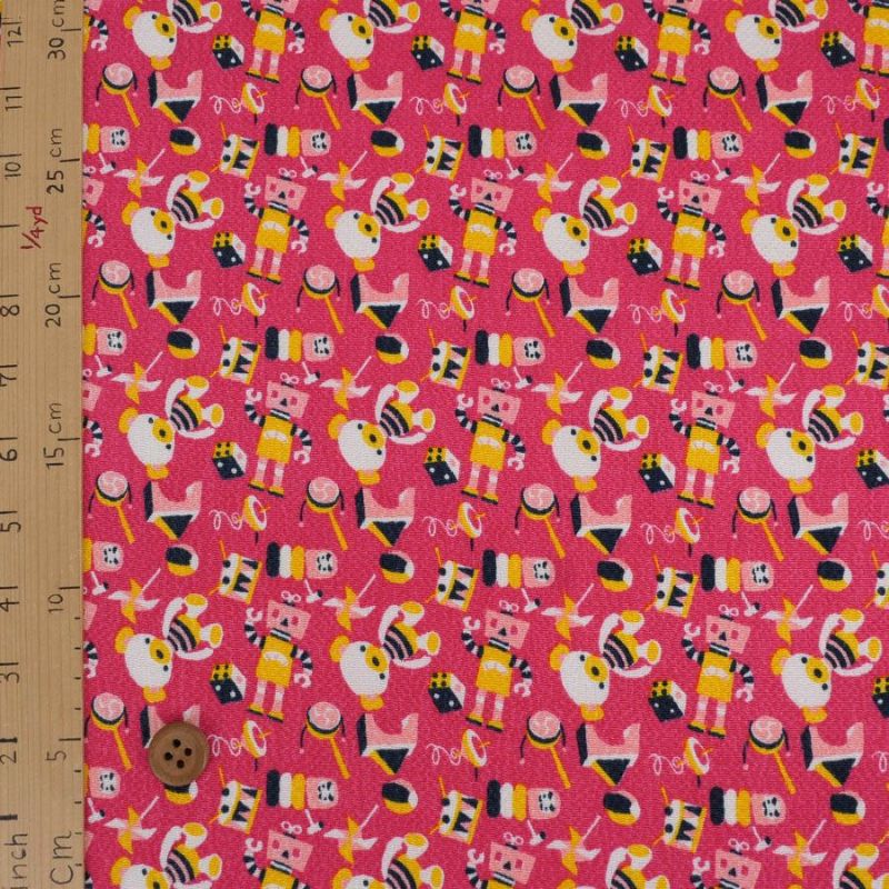 ちりめん生地 おもちゃのパレード(ピンク) 10cm単位 切り売り
