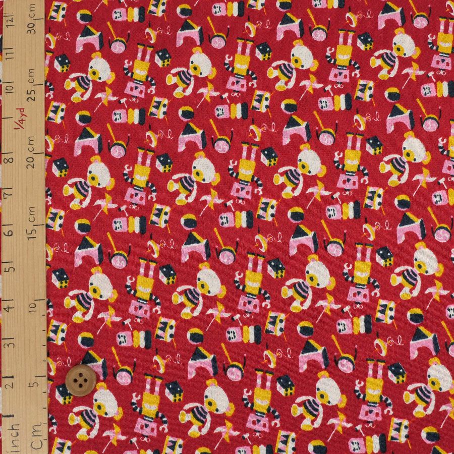 ちりめん生地 おもちゃのパレード(赤) 10cm単位 切り売り