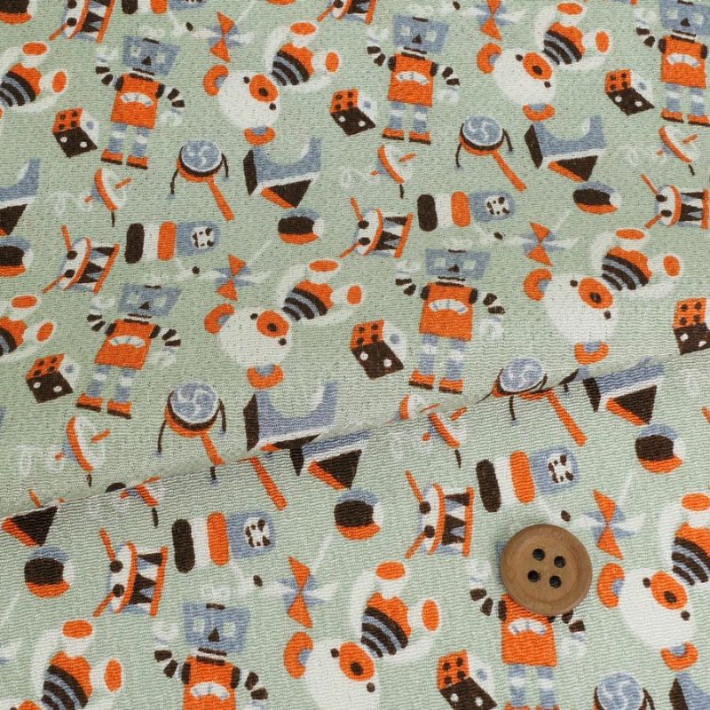 ちりめん生地 おもちゃのパレード(うす青磁) 10cm単位 切り売り