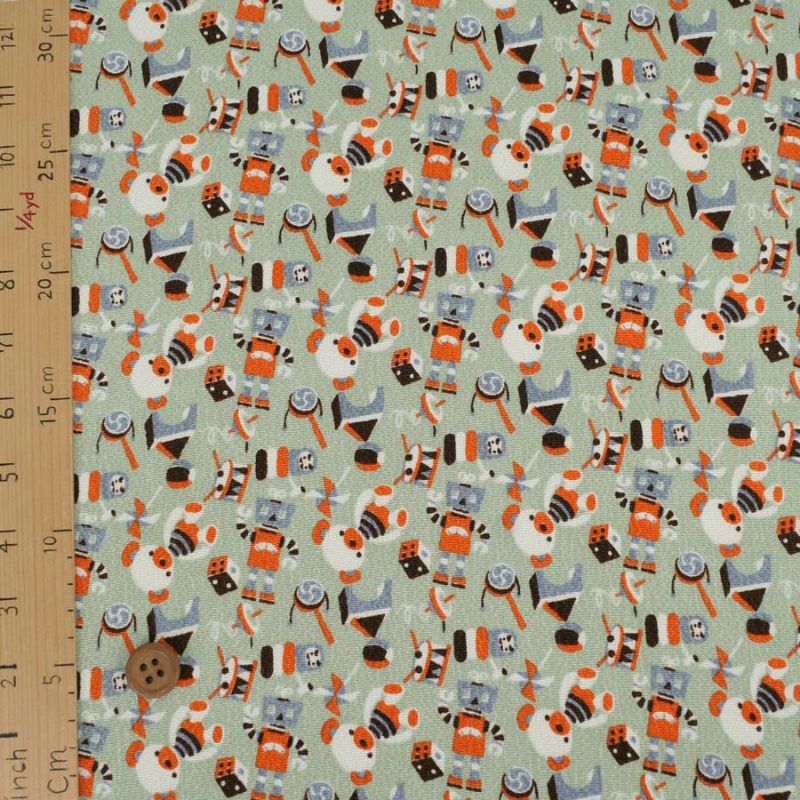 ちりめん生地 おもちゃのパレード(うす青磁) 10cm単位 切り売り