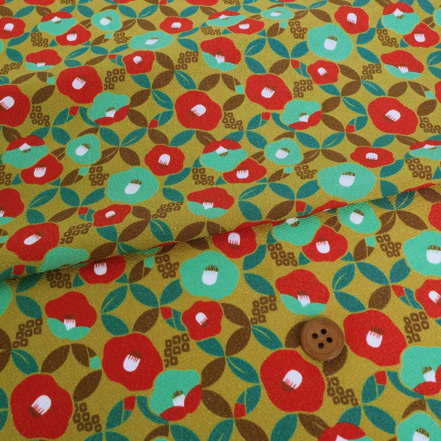 ポリちりめん生地 椿七宝(からし色) 10cm単位 切り売り 和の小物・洋服に 水洗い可能なポリエステル しっぽう つばき