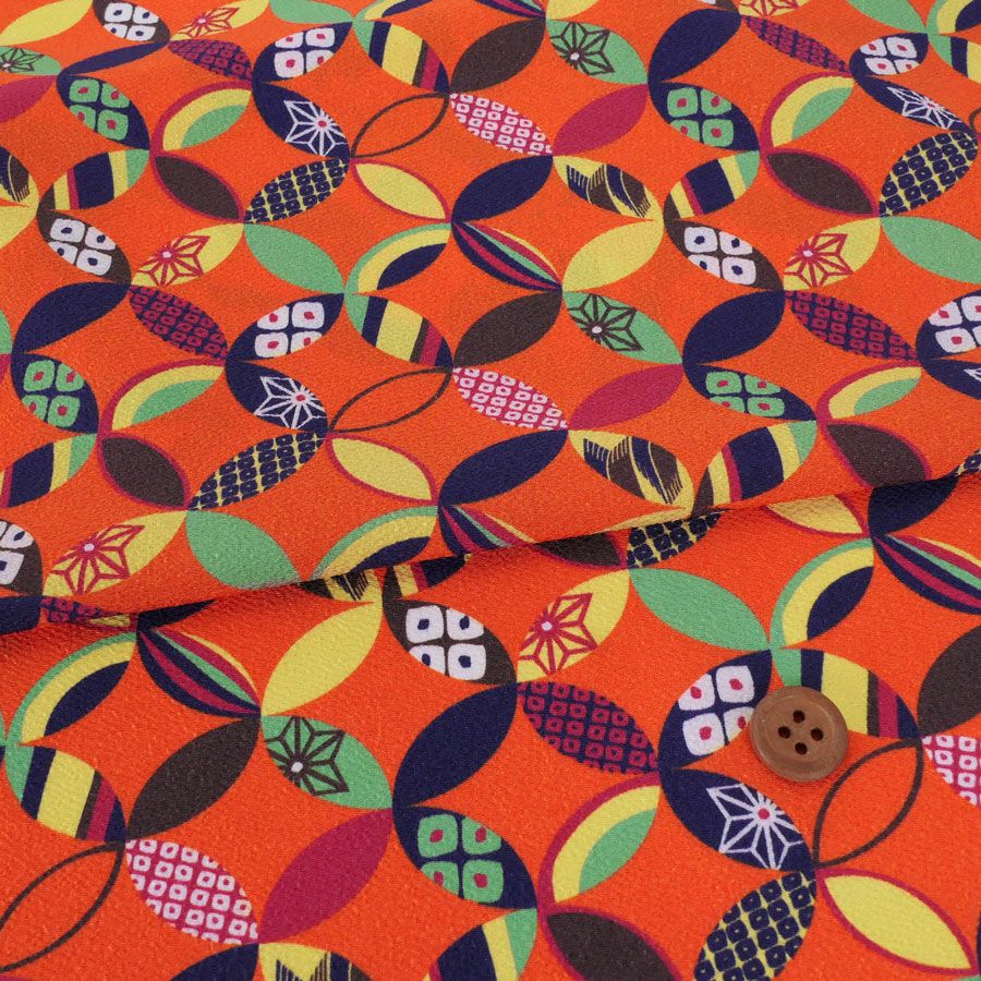 ポリちりめん生地 彩り七宝(柿色) 10cm単位 切り売り よさこい衣装・洋服に 水洗い可能なポリエステル縮緬 七宝模様