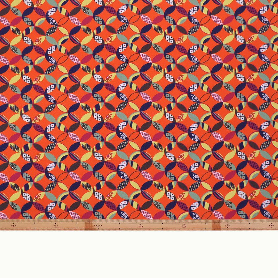 ポリちりめん生地 彩り七宝(柿色) 10cm単位 切り売り よさこい衣装・洋服に 水洗い可能なポリエステル縮緬 七宝模様
