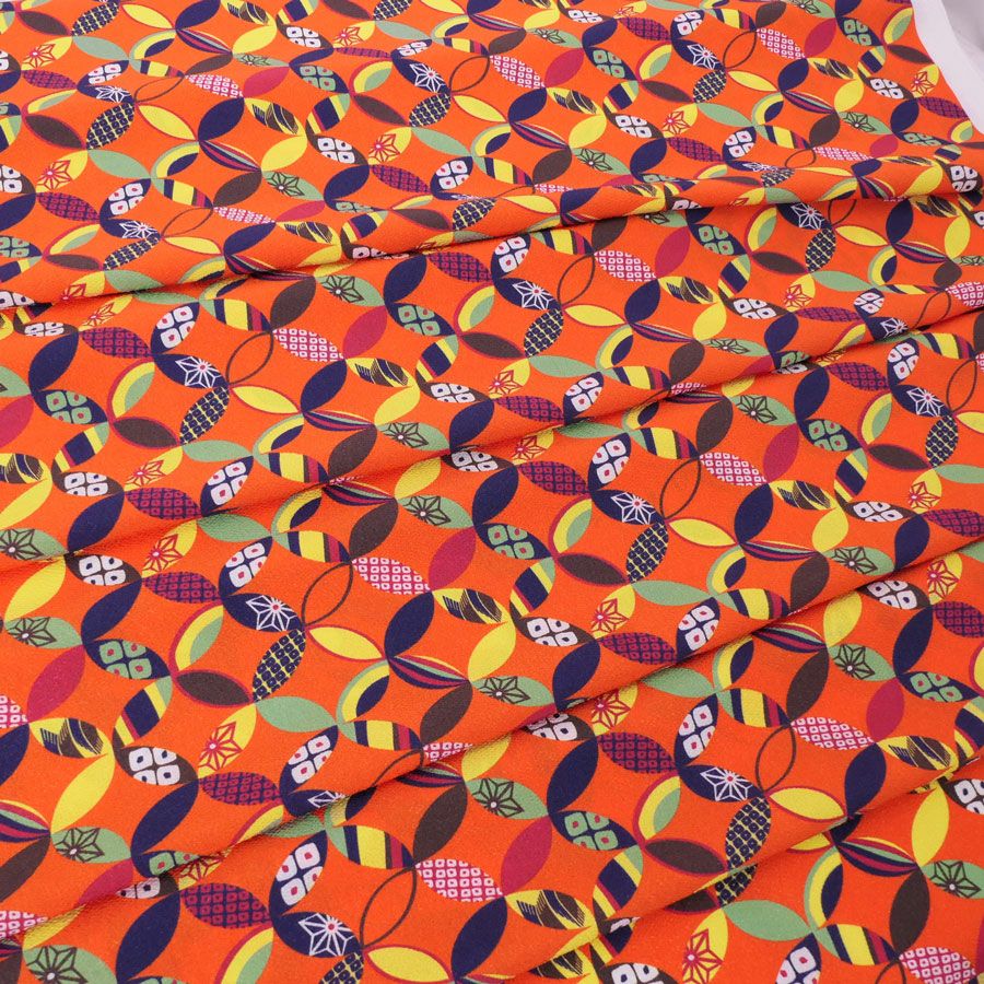 ポリちりめん生地 彩り七宝(柿色) 10cm単位 切り売り よさこい衣装・洋服に 水洗い可能なポリエステル縮緬 七宝模様