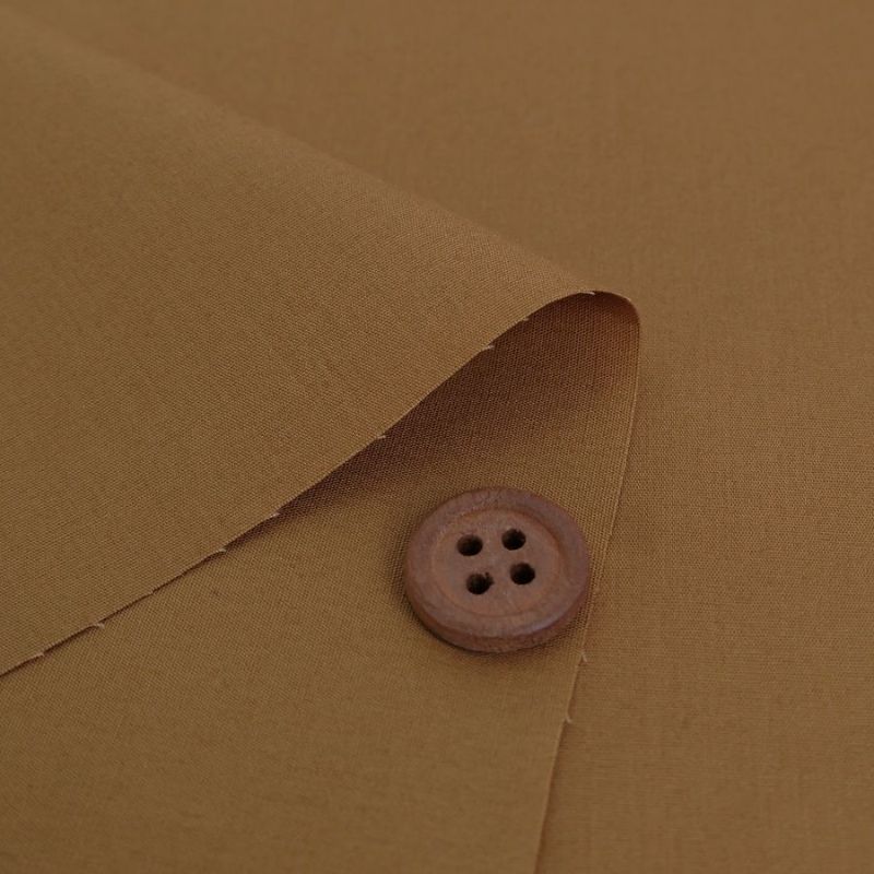 綿ブロード無地(ゴールドベージュ) 10cm単位 切り売り 無地ブロード生地 飴色 キャメルカラー 中薄手コットン 衣類向き