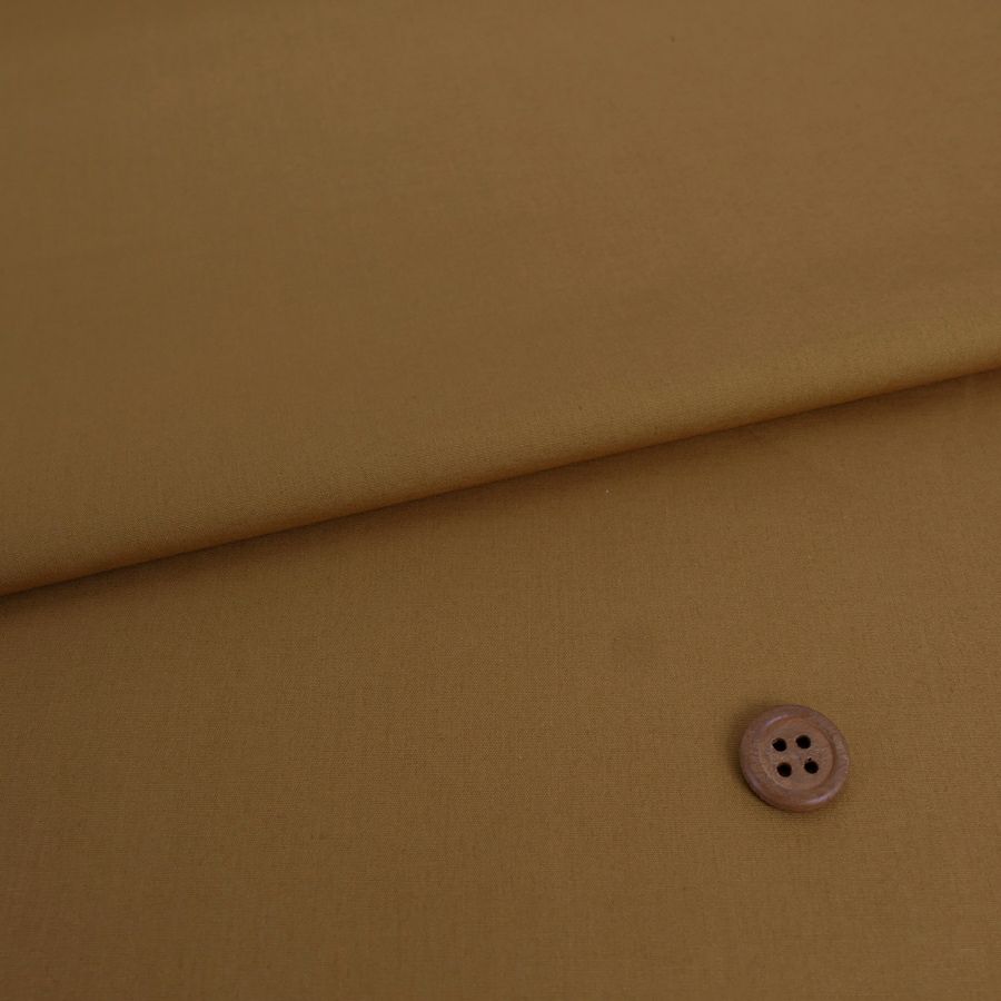 綿ブロード無地(ゴールドベージュ) 10cm単位 切り売り 無地ブロード生地 飴色 キャメルカラー 中薄手コットン 衣類向き