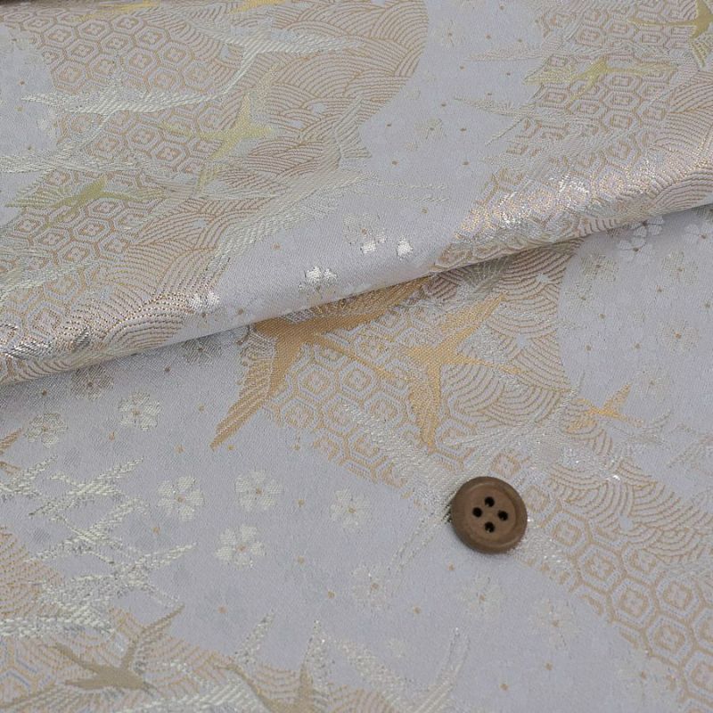 金襴生地(金らん) 吉祥流水に鶴(白銀) 10cm単位 切り売り 吉祥文様の鶴と桜柄上品な西陣織物 慶事の小物やテーブル回りに