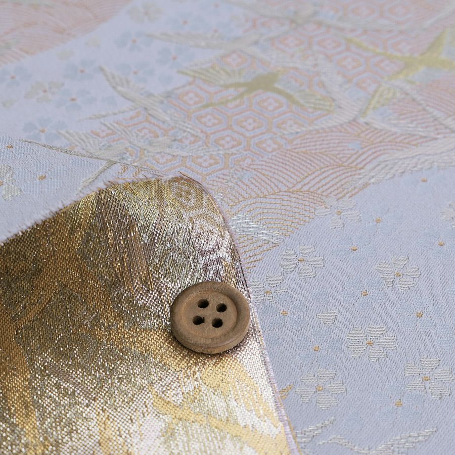 金襴生地(金らん) 吉祥流水に鶴(白銀) 10cm単位 切り売り 吉祥文様の鶴と桜柄上品な西陣織物 慶事の小物やテーブル回りに