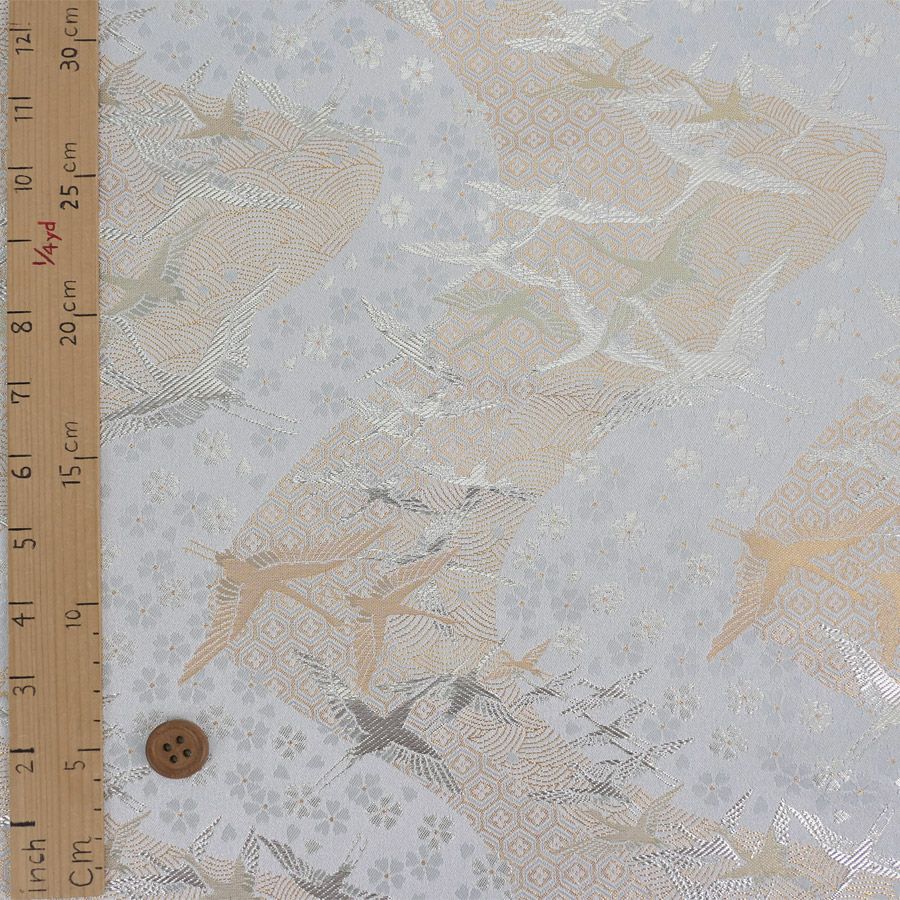 金襴生地(金らん) 吉祥流水に鶴(白銀) 10cm単位 切り売り 吉祥文様の鶴と桜柄上品な西陣織物 慶事の小物やテーブル回りに