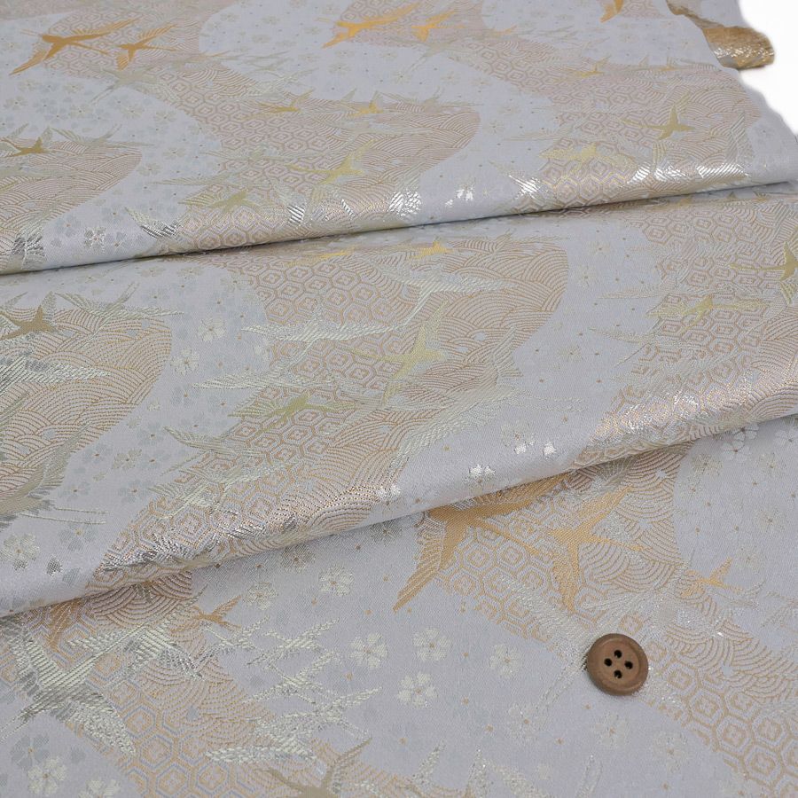 金襴生地(金らん) 吉祥流水に鶴(白銀) 10cm単位 切り売り 吉祥文様の鶴と桜柄上品な西陣織物 慶事の小物やテーブル回りに