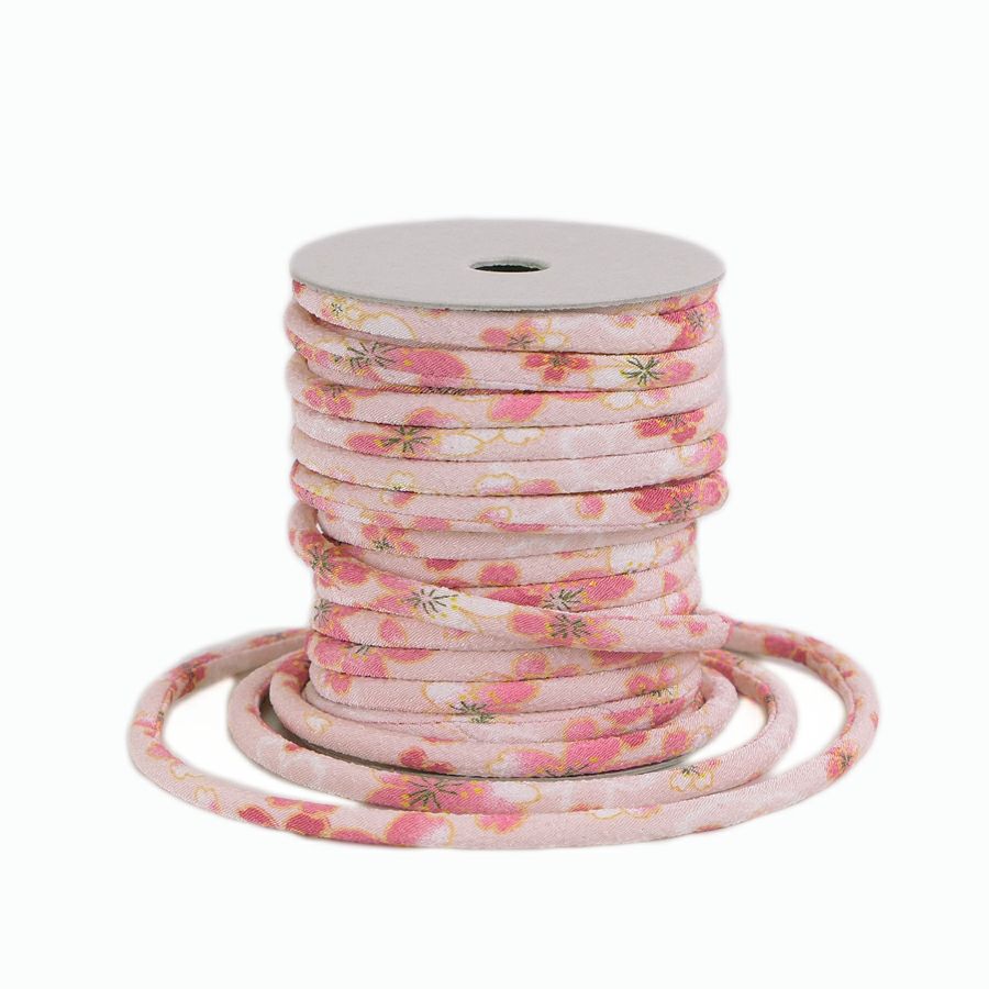 ちりめん丸ひも・柄・4ミリ(実寸約4-6ミリ) おぼろ桜・ピンク 10cm単位 切り売り 和装髪飾りひも 和柄コード 和の紐 チリメン生地のヒモ ピンク色