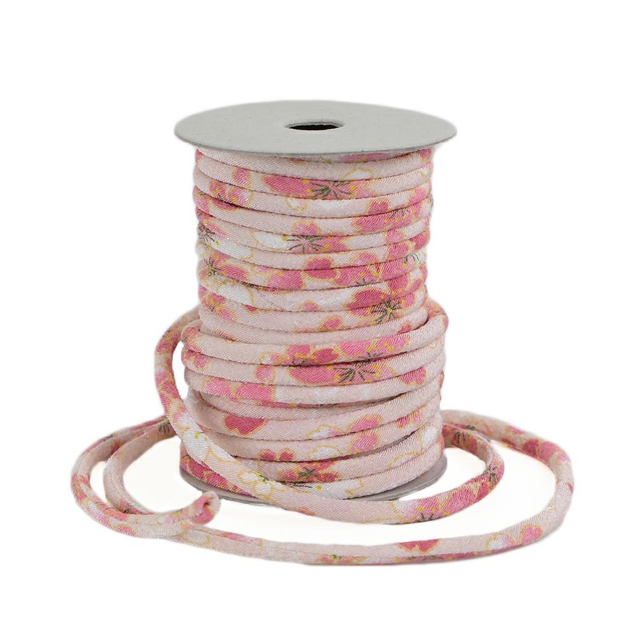 ちりめん丸ひも・柄・3ミリ(実寸約3-4ミリ) おぼろ桜・ピンク 10cm単位 切り売り 縮緬丸紐 和のひも 和風コード花柄 薄いピンク色 クラフト材料