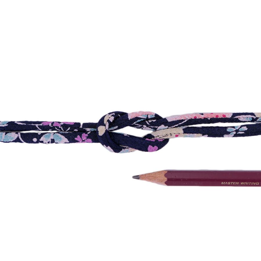 ちりめん丸ひも・柄・4ミリ(実寸約4-6ミリ) 桜祭・紺 10cm単位 切り売り 和装髪飾りひも 和柄コード 和の紐 チリメン生地のヒモ 桜柄紺色