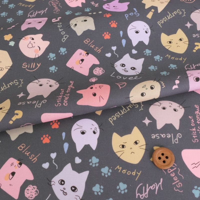 コットン生地 カラフル猫面相(グレー) 10cm単位 切り売り ネコ柄生地グレイ 猫柄木綿生地 ポップなねこ柄布 noraモエラン