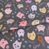 コットン生地 カラフル猫面相(グレー) 10cm単位 切り売り ネコ柄生地グレイ 猫柄木綿生地 ポップなねこ柄布 noraモエラン