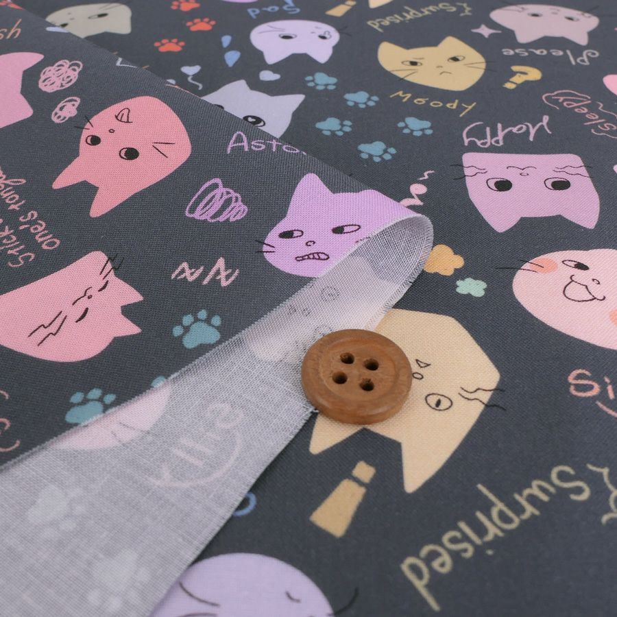 コットン生地 カラフル猫面相(グレー) 10cm単位 切り売り ネコ柄生地グレイ 猫柄木綿生地 ポップなねこ柄布 noraモエラン