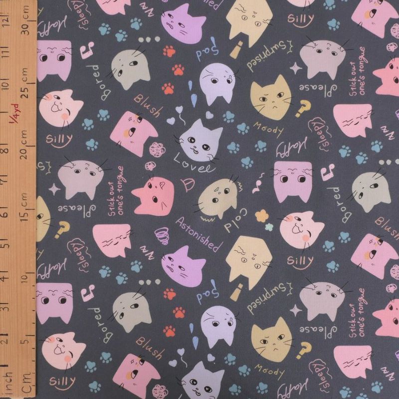 コットン生地 カラフル猫面相(グレー) 10cm単位 切り売り ネコ柄生地グレイ 猫柄木綿生地 ポップなねこ柄布 noraモエラン