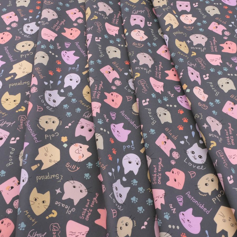 コットン生地 カラフル猫面相(グレー) 10cm単位 切り売り ネコ柄生地グレイ 猫柄木綿生地 ポップなねこ柄布 noraモエラン