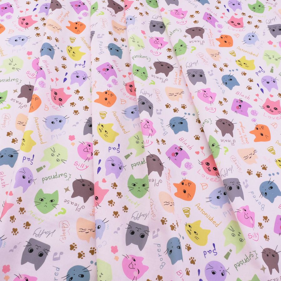 コットン生地 カラフル猫面相(白) 10cm単位 切り売り ネコ柄生地 猫柄木綿生地 ねこ柄布地 かわいい ポップな柄 nora