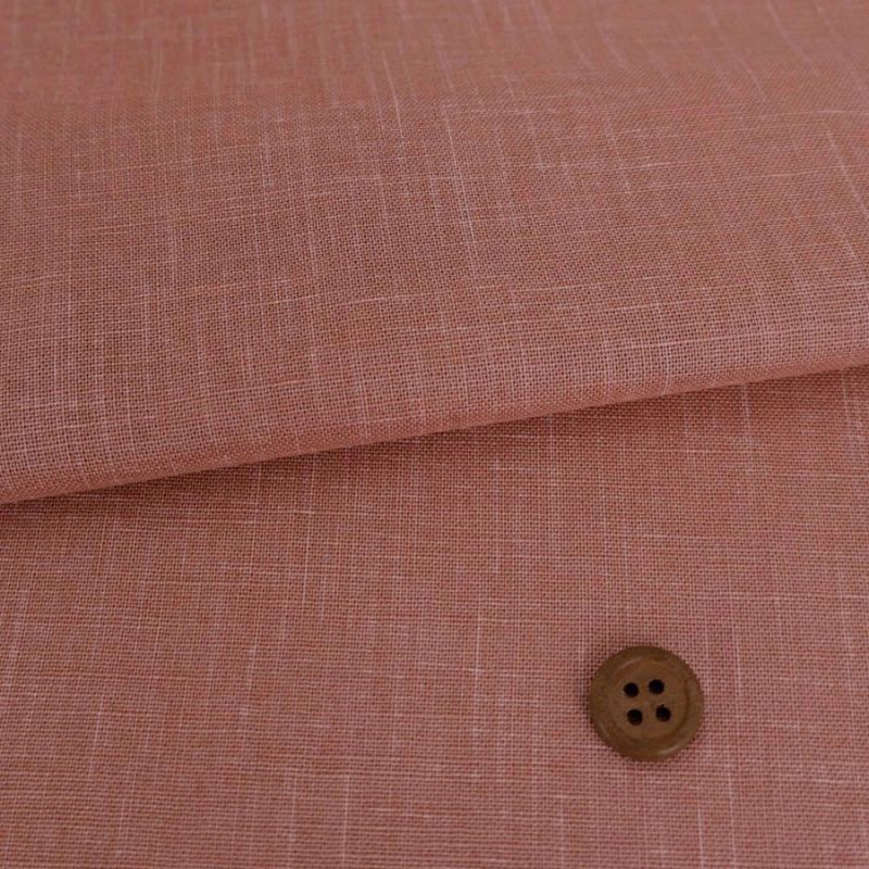 無地かすり風ムラ糸もめん生地 (くすみサーモン) 50cm単位 切り売り ナチュラルな風合い 大人のピンク ムラ糸クロス木綿100％ 紅梅