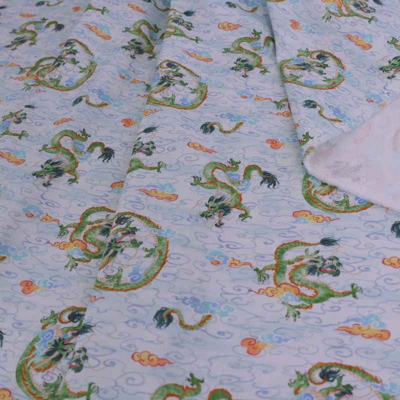 和柄コットン生地 雲海の龍(淡い水色)