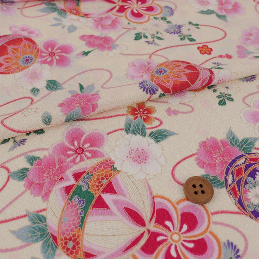 ポリちりめん生地 雅手まり花尽くし(アイボリー/桃) 10cm単位 切り売り