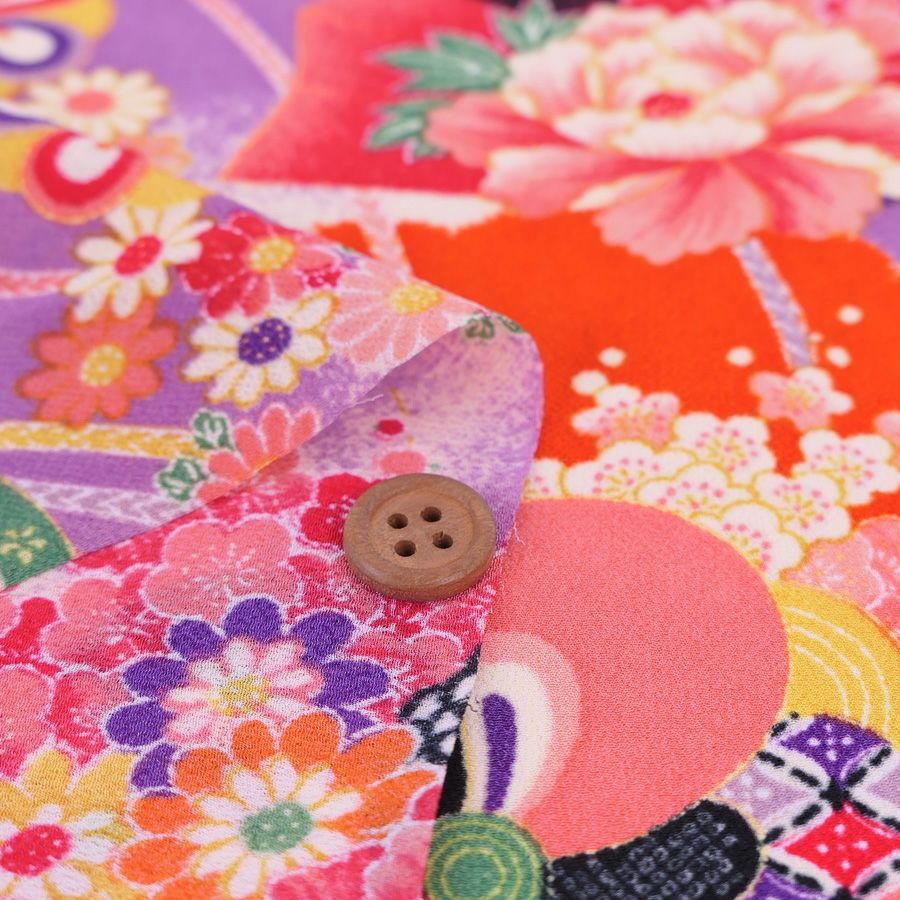 一越ちりめん生地 花孔雀(オレンジ) 10cm単位 切り売り