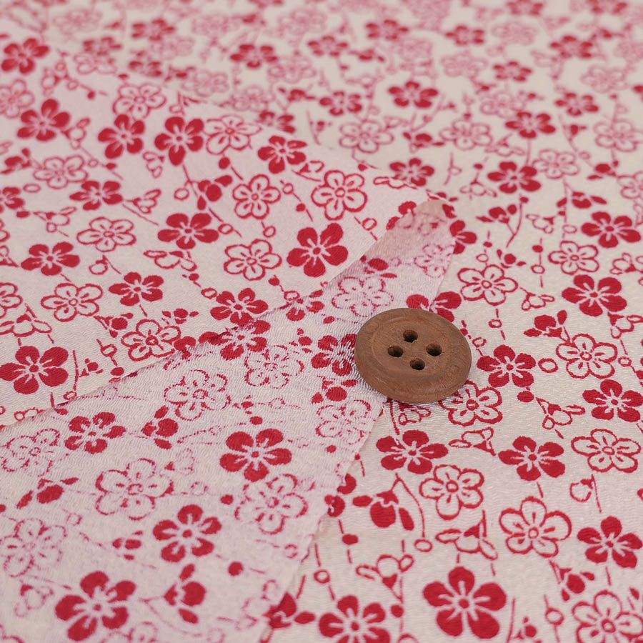 ポリちりめん生地 流れ梅(アイボリー/赤) 10cm単位 切り売り