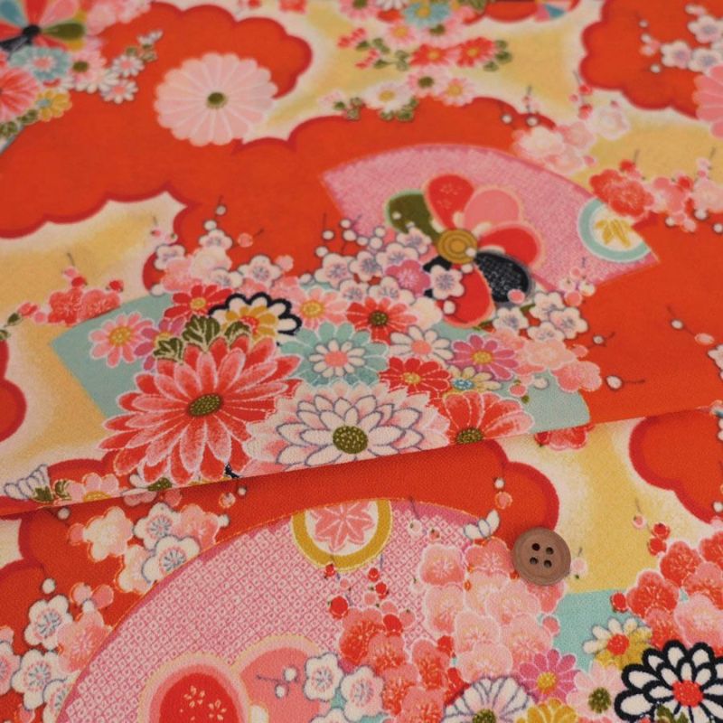 一越ちりめん生地 扇に菊と牡丹(柿色) 10cm単位 切り売り