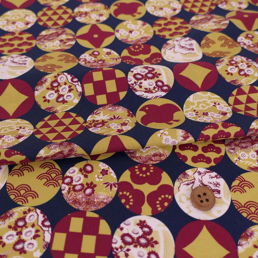和柄コットン生地 円窓に吉祥模様(濃紺/からし) 10cm単位 切り売り