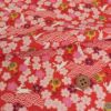 和柄コットン生地 うさぎと桜の吉祥文様(赤) 10cm単位 切り売り