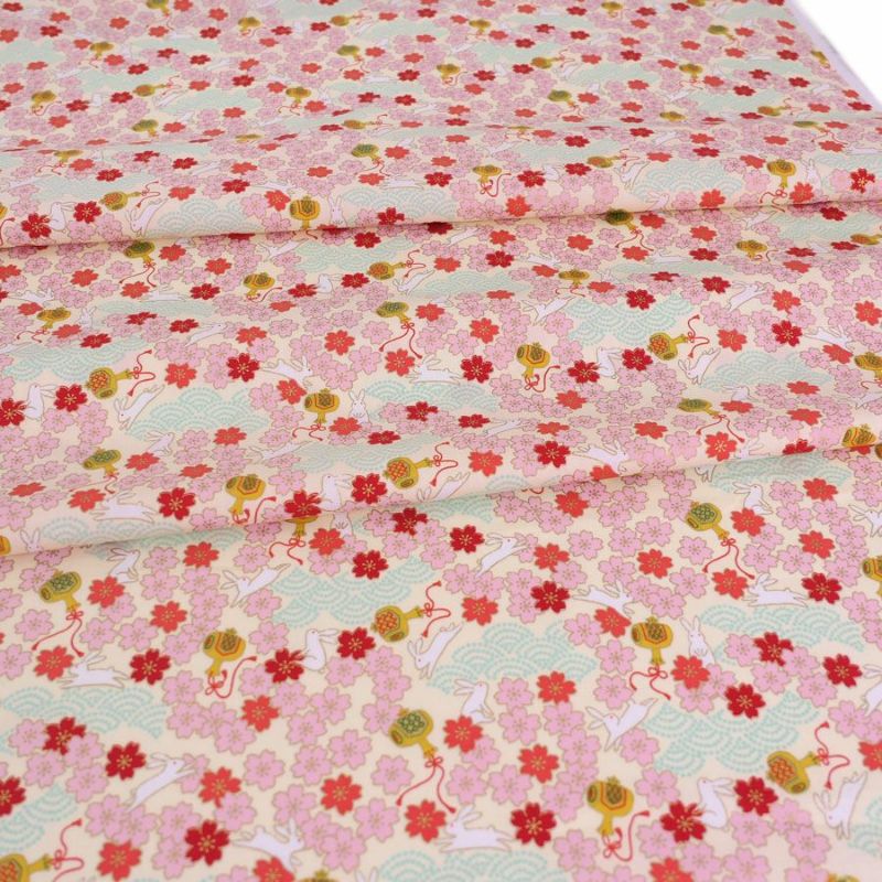 和柄コットン生地 うさぎと桜の吉祥文様(アイボリー) 10cm単位 切り売り